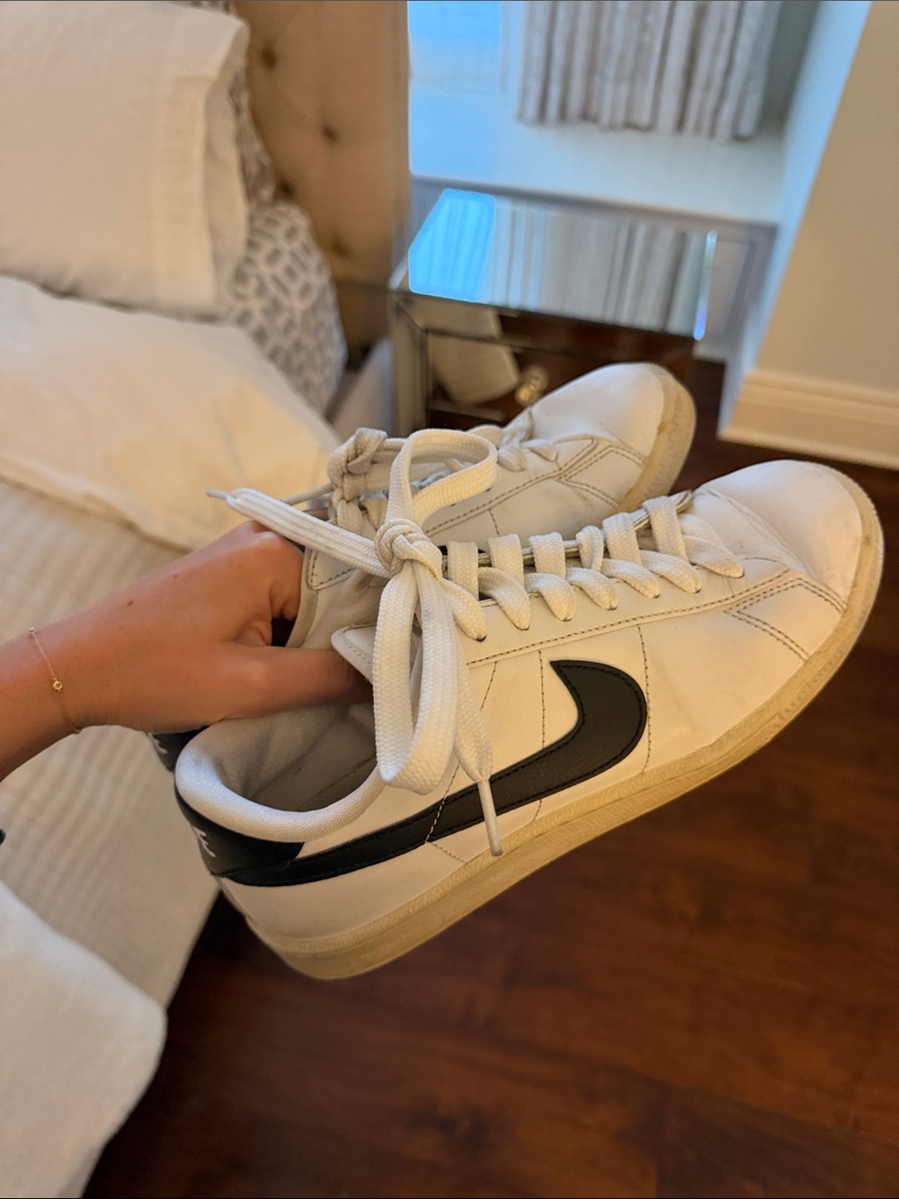Nike Women’s White Leather Sneakers with Black Swoosh